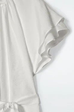 BLUSA CON CAPAS Y CINTURÓN DE LAZADA*COS Clearance