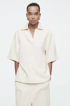 POLO OVERSIZE DE SARGA Y LINO*COS Outlet