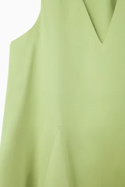 VESTIDO LARGO MAXIVOLUMEN CON ESCOTE DE PICO*COS Best